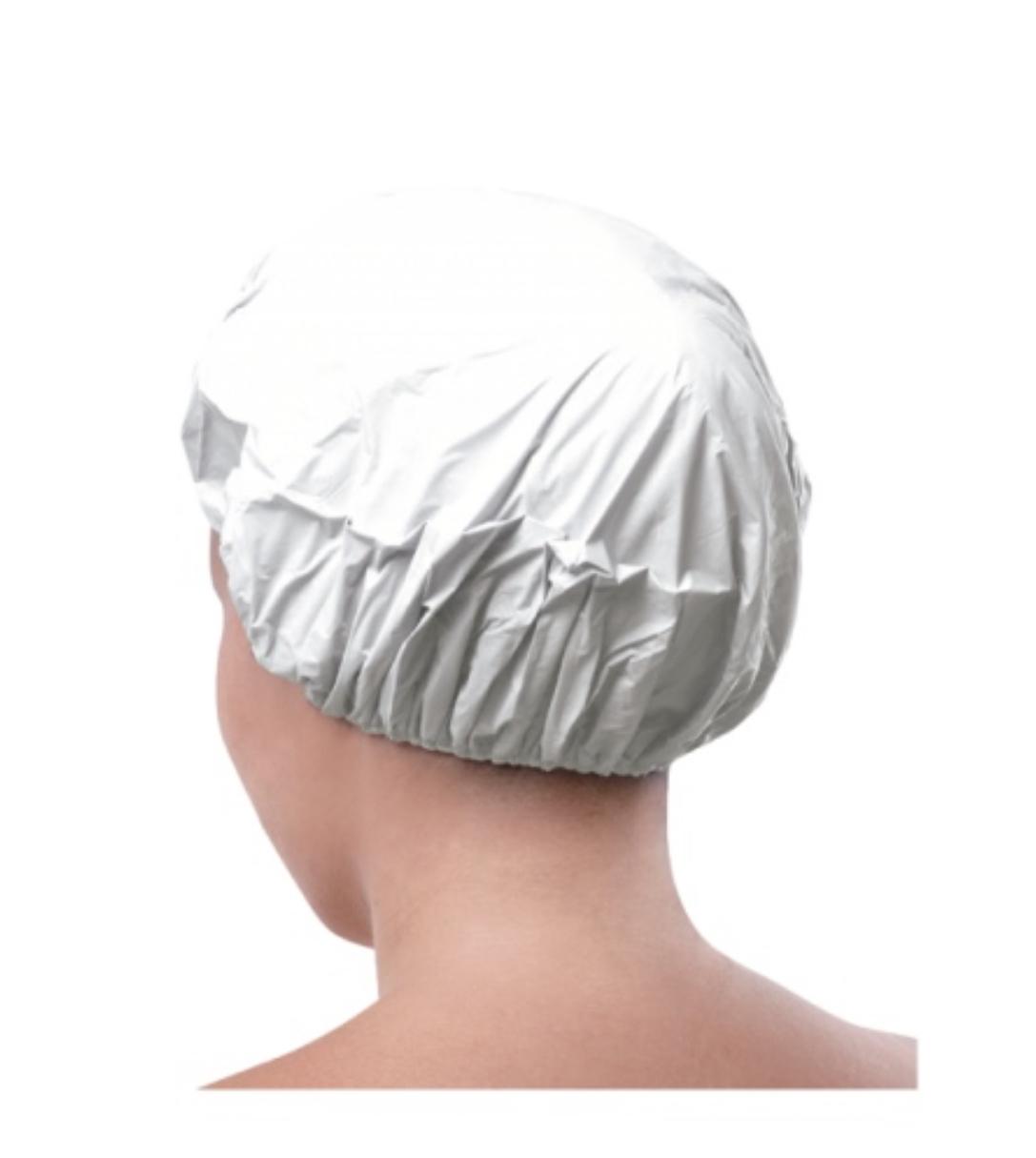 modo de empleo de gorro lavacabezas puesto en una persona